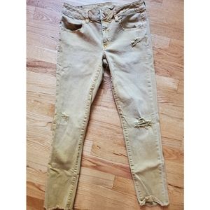Mustard yellow distressed jeggings